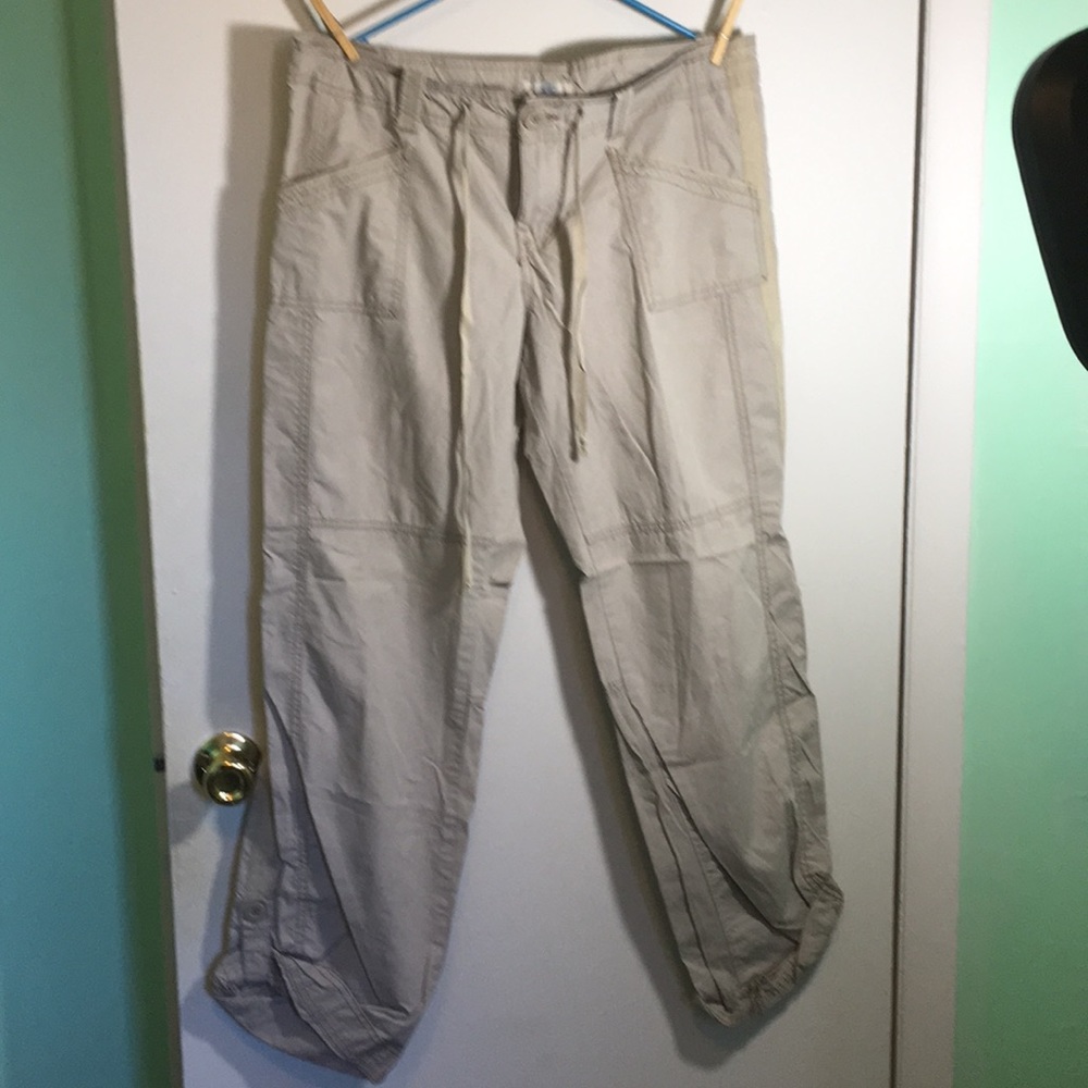 Tan pants and cuffed bottoms